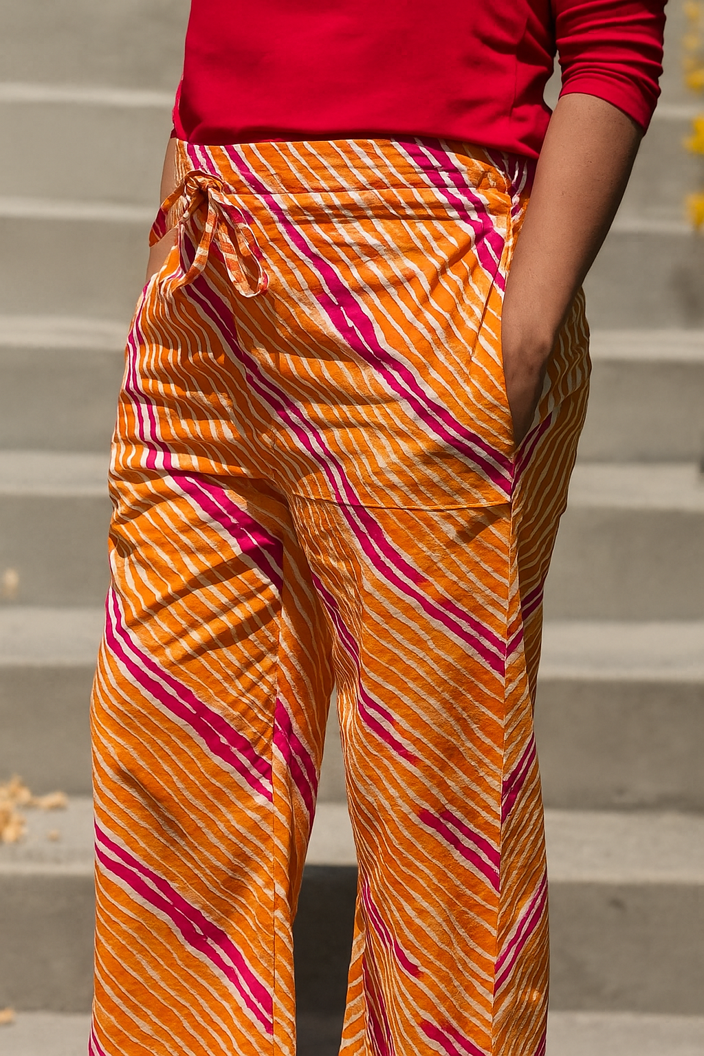 Orange and pink wavy striped loose fitted lounge pants with pockets