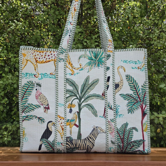 white jungle print quilted cotton tote bag reversible machine washable with pockets lifestyle shot
