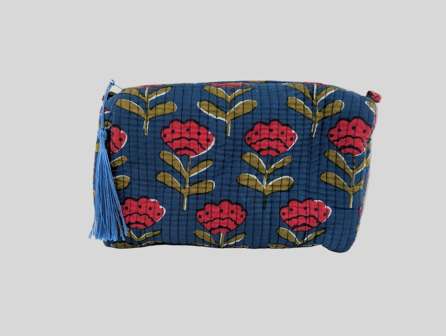 Red Tulips in Blue Toiletry Bag