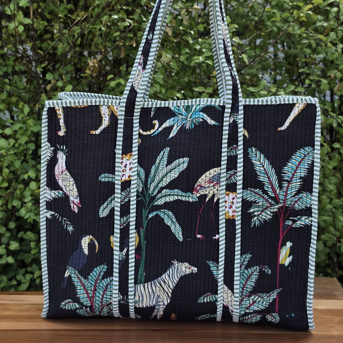 black jungle print quilted cotton tote bag reversible machine washable with pockets lifestyle shot