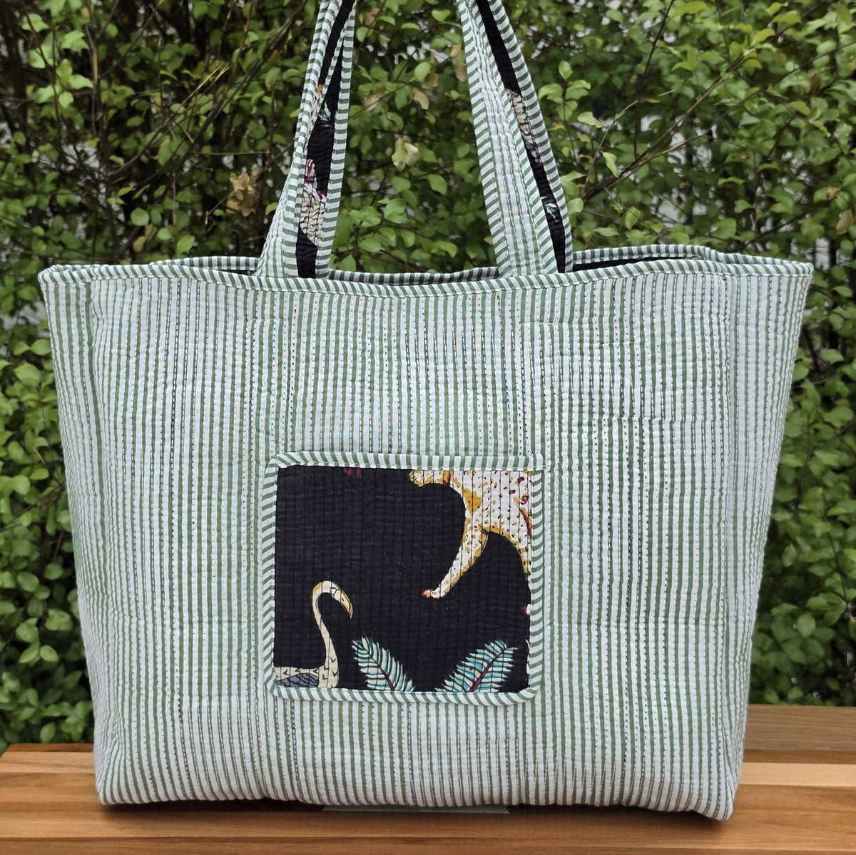 black jungle print quilted cotton tote bag reversible machine washable with pockets reversible lifestyle shot