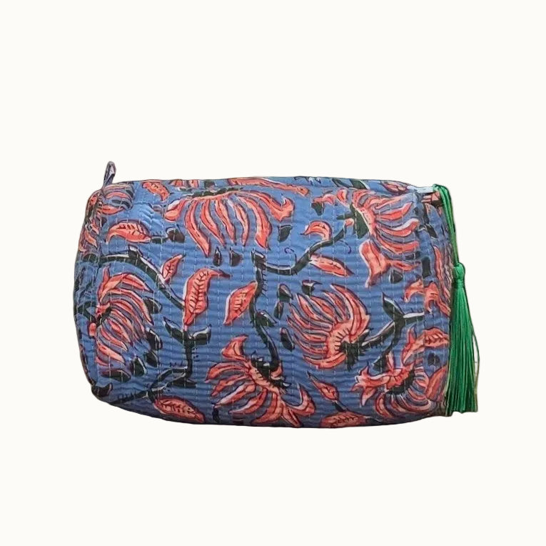 blue and coral pink floral print makeup bag with tassles and waterproof lining and pockets