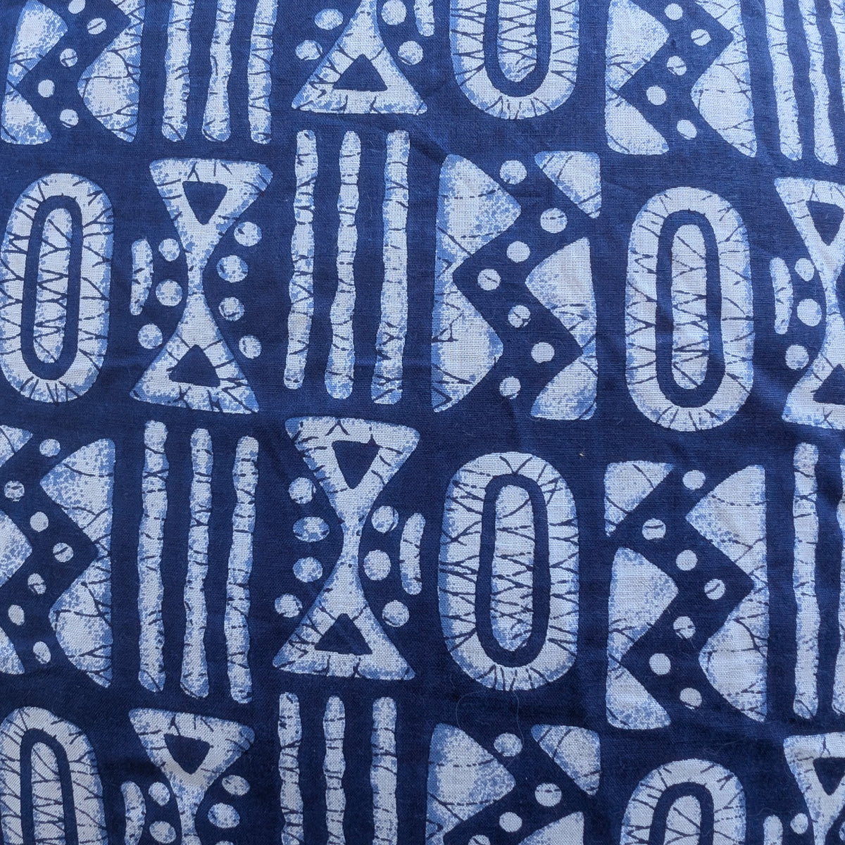 unisex white and blue batik patterned short sleeve button down shirt with pocket and wooden buttons