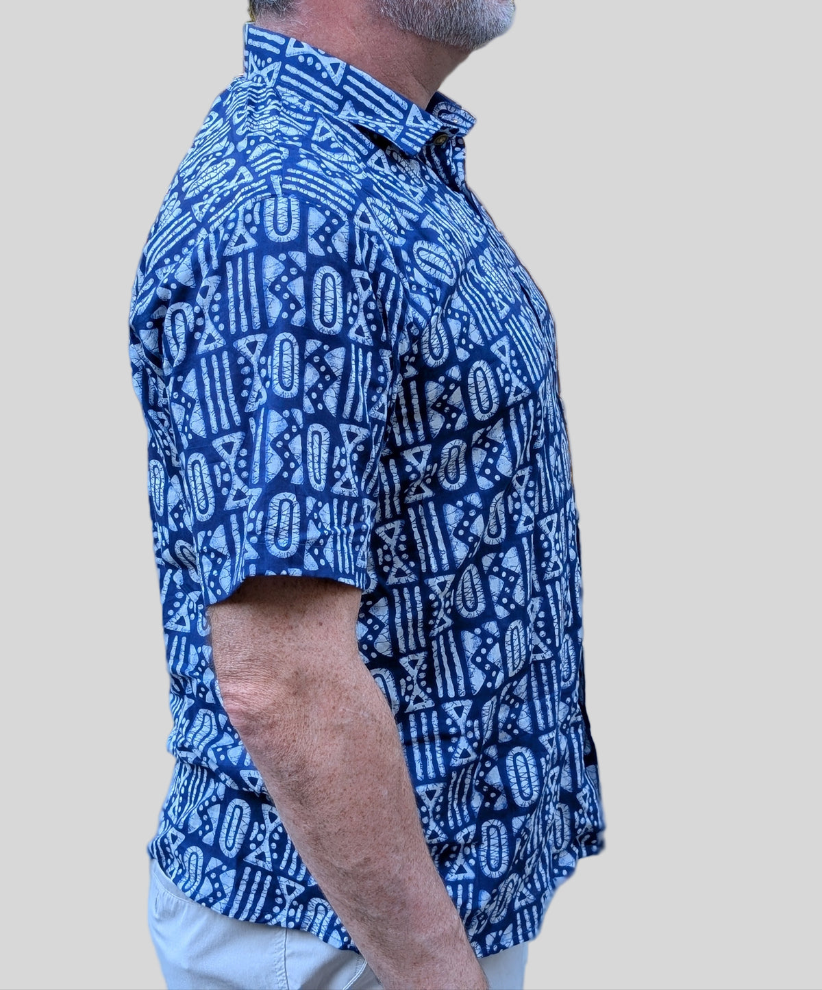 unisex white and blue batik patterned short sleeve button down shirt with pocket and wooden buttons