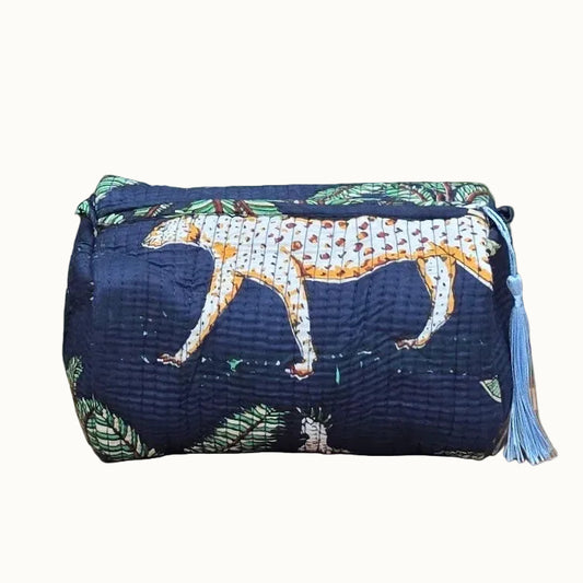 blue jungle print makeup bag with tassles and waterproof lining and pockets