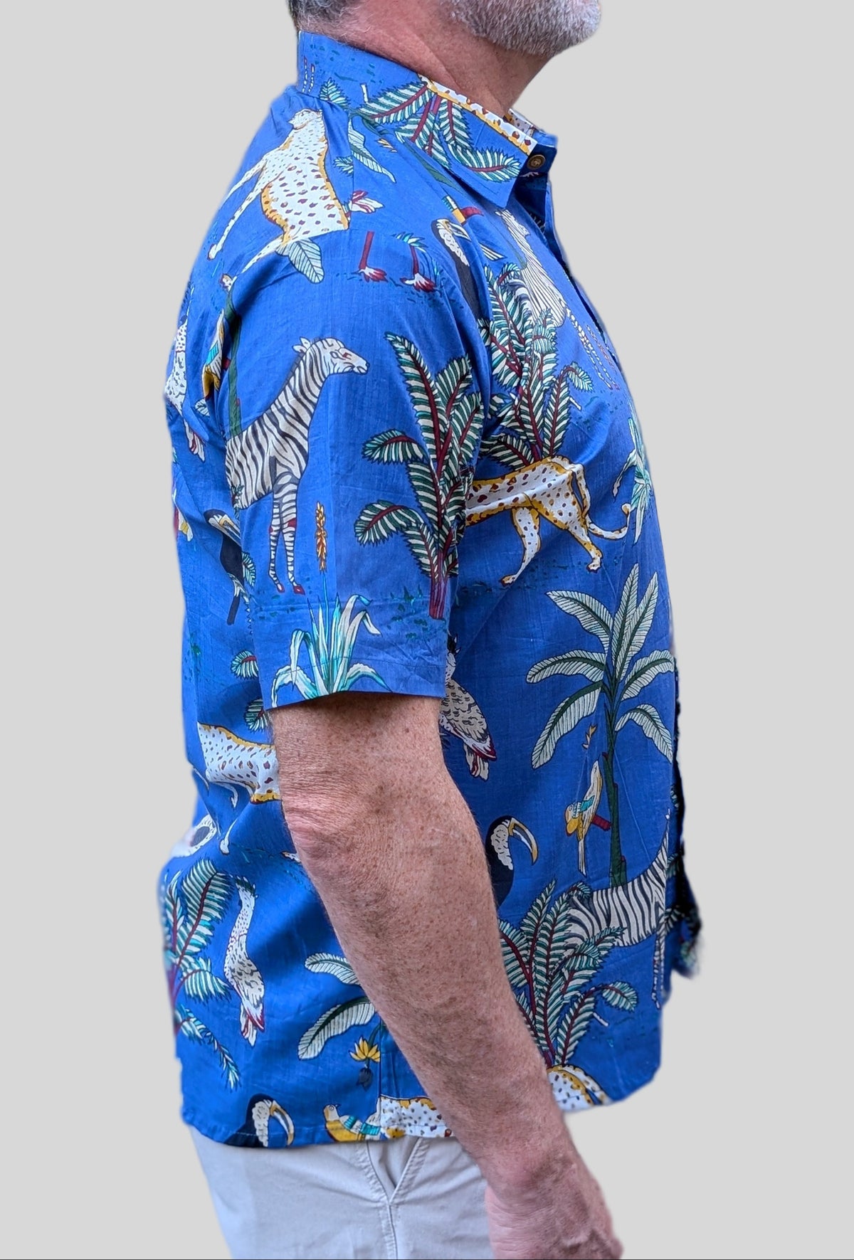 unisex blue color jungle tropical print short sleeve button down shirt with wooden buttons