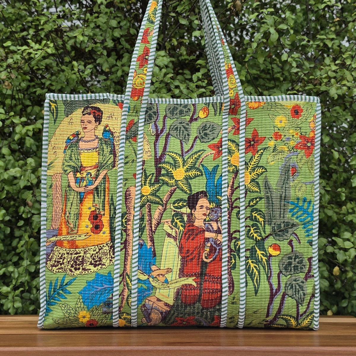 green freida kahlo jungle print quilted cotton tote bag reversible machine washable with pockets lifestyle shot