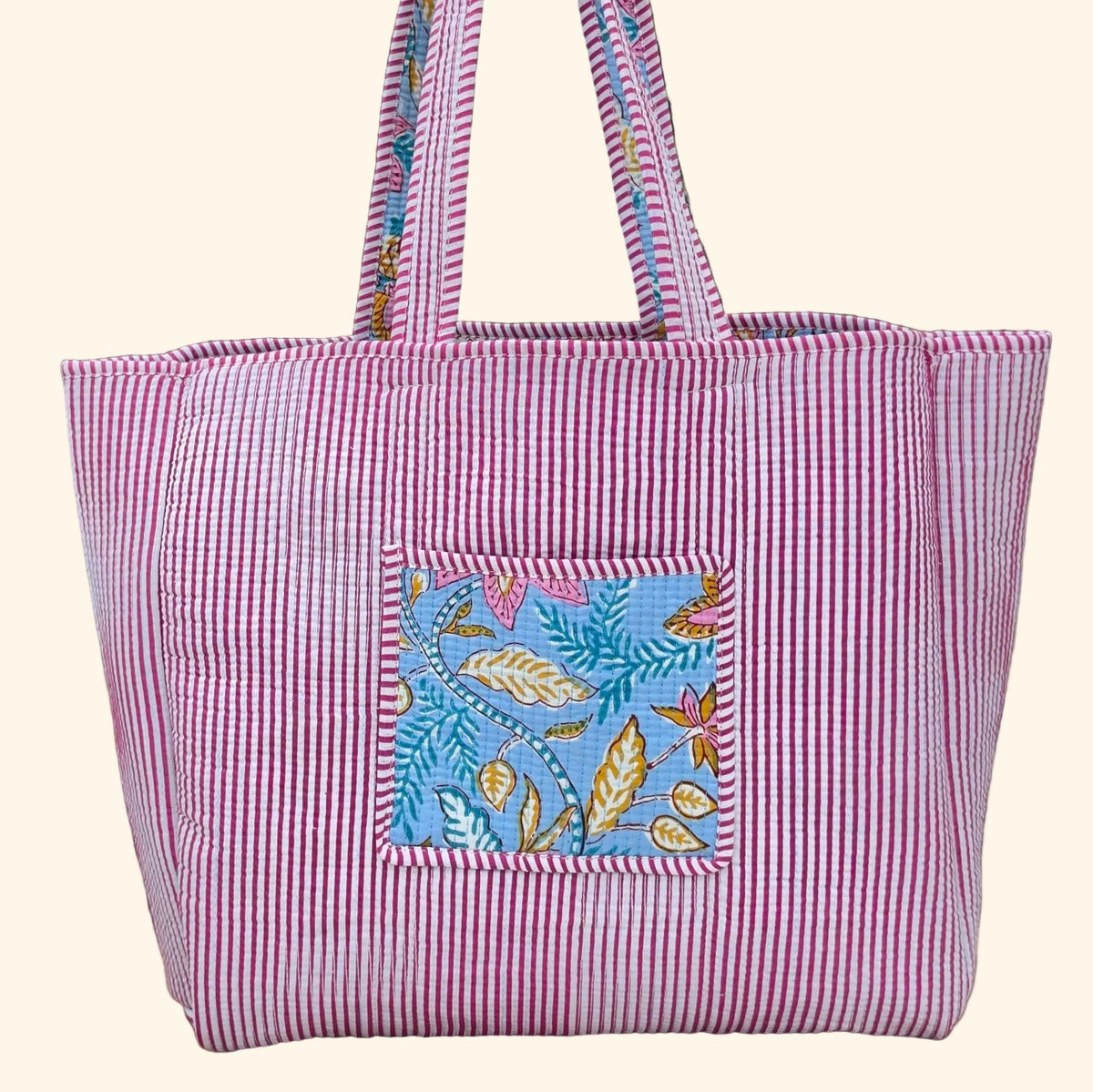 light blue floral and leaf pattern quilted cotton tote bag reversible machine washable with pockets plain reverse image