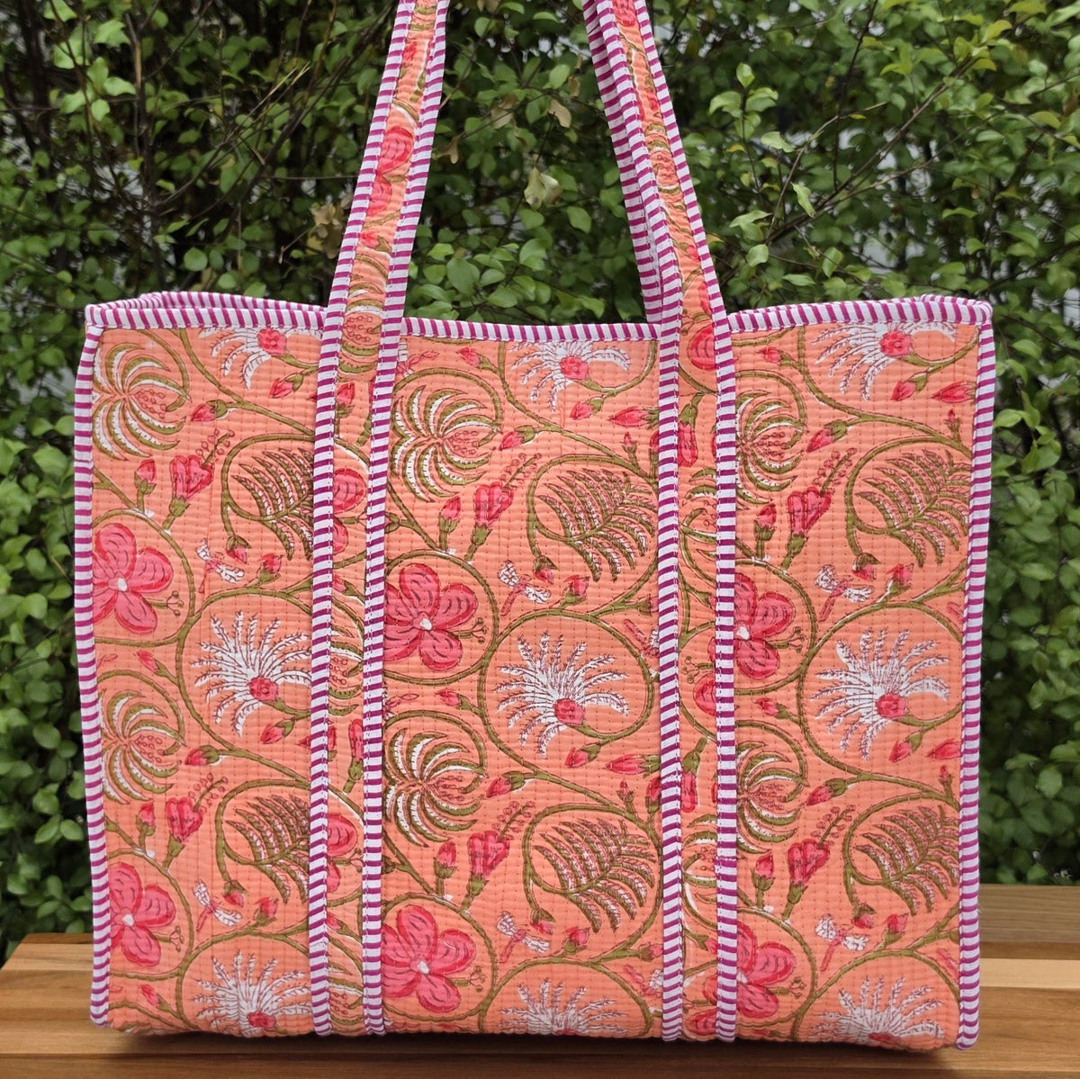 orange floral pastel print quilted cotton tote bag reversible machine washable with pockets lifestyle image