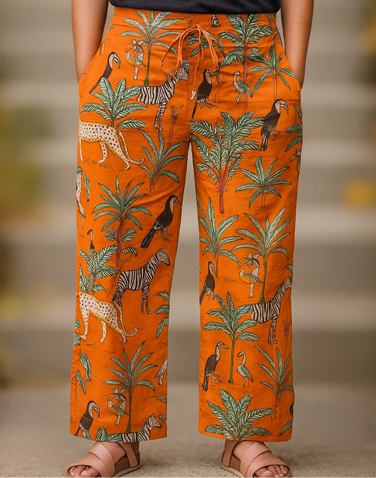 Orange pants with jungle animal pattern loose fitted lounge pants with pockets