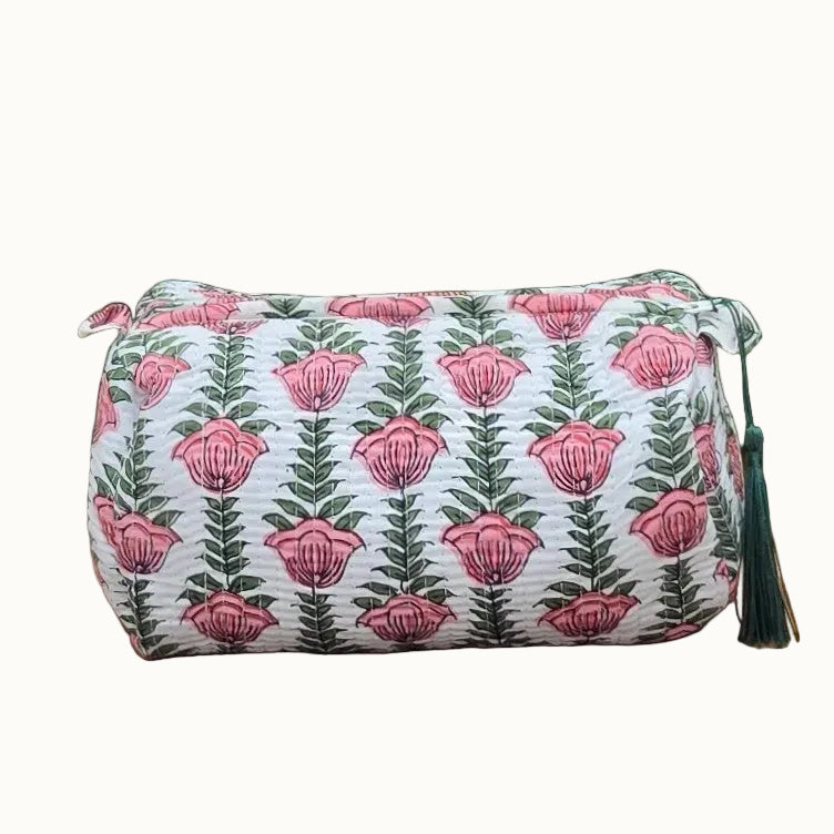 pink flowers in white background makeup bag with tassles and waterproof lining and pockets