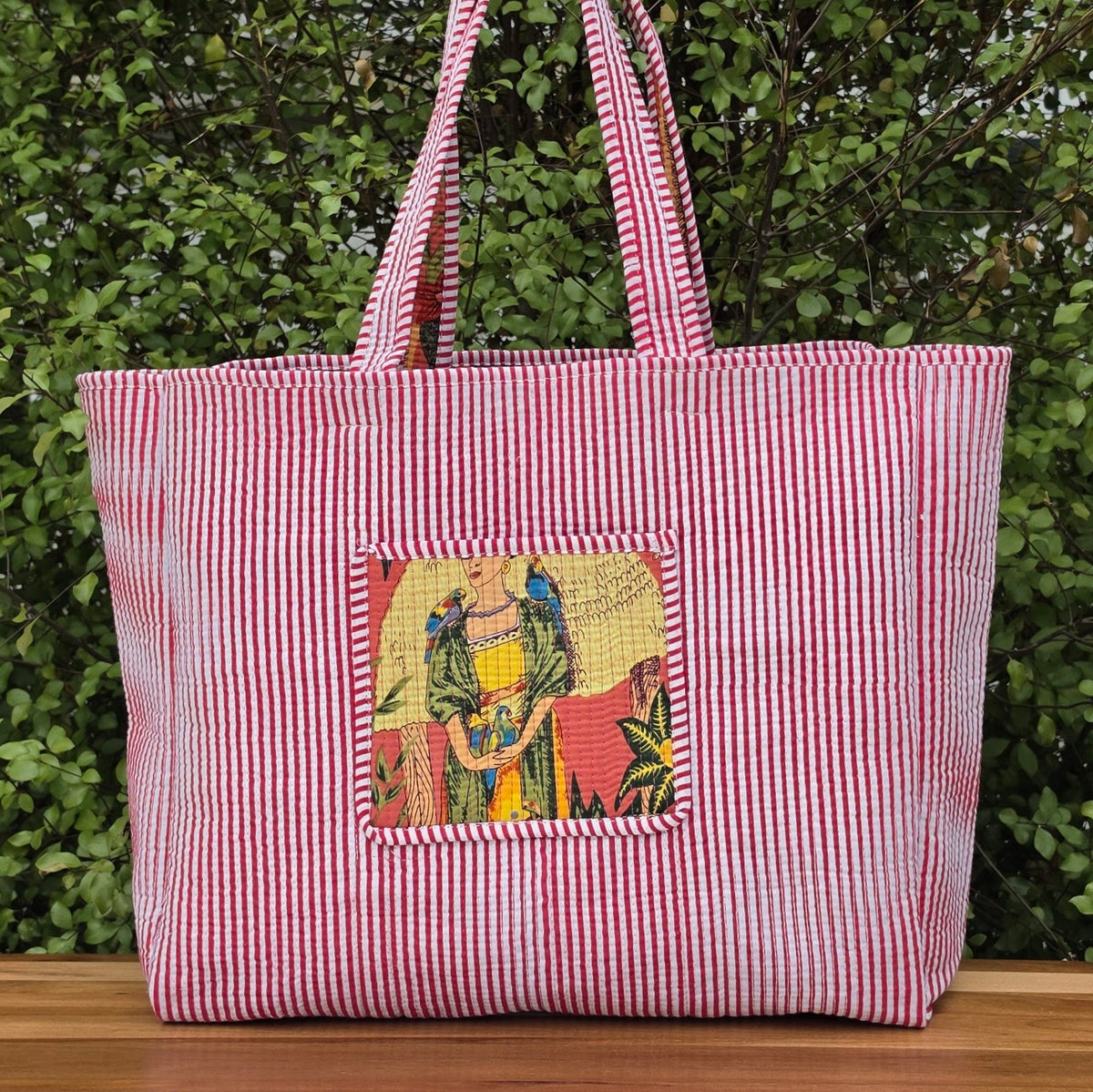 pink freida kahlo jungle print quilted cotton tote bag reversible machine washable with pockets lifestyle reversible shot