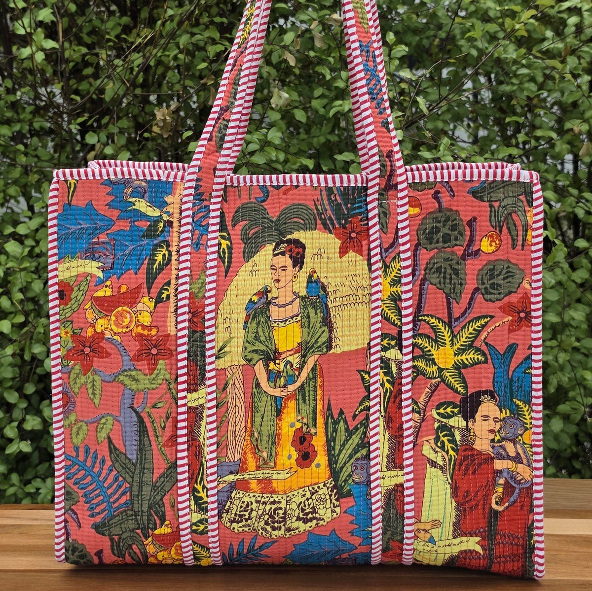 pink freida kahlo jungle print quilted cotton tote bag reversible machine washable with pockets lifestyle shot