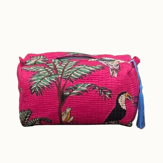 pink jungle print makeup bag with tassles and waterproof lining and pockets