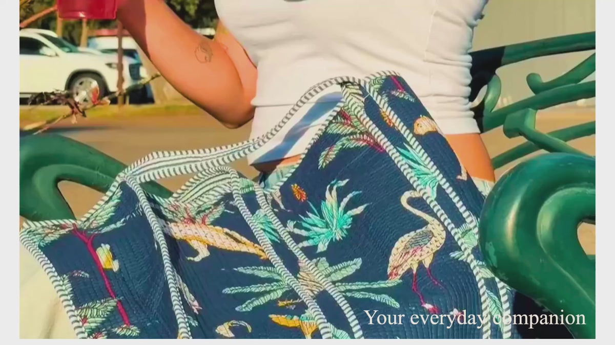 Load video: blue cheetah print tote bag with premium cotton reversible machine washable with pocket