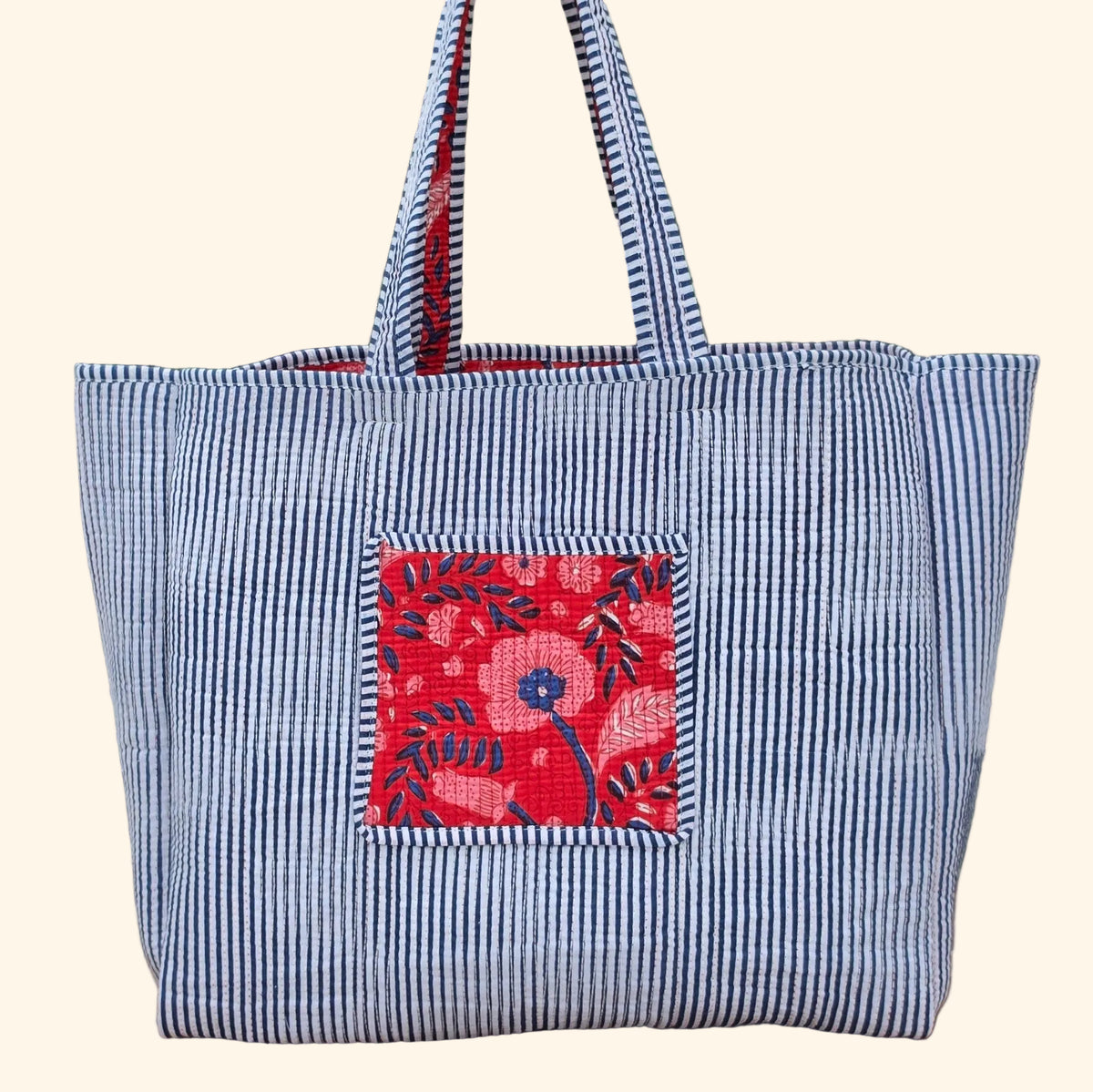 red and blue blockprint floral pattern quilted cotton tote bag reversible machine washable with pockets plain reverse image