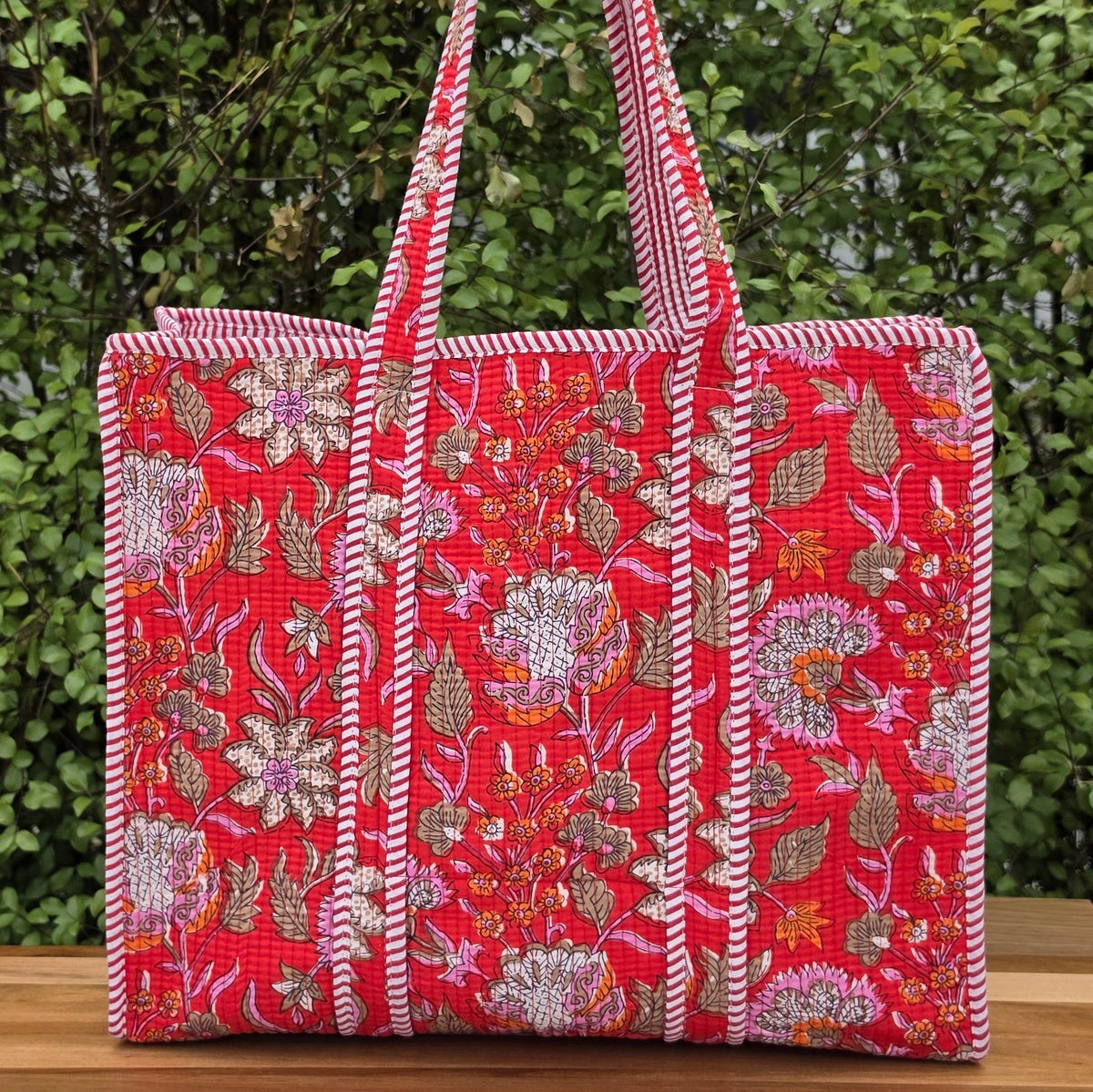 red floral quilted cotton tote bag reversible machine washable with pockets lifestyle image