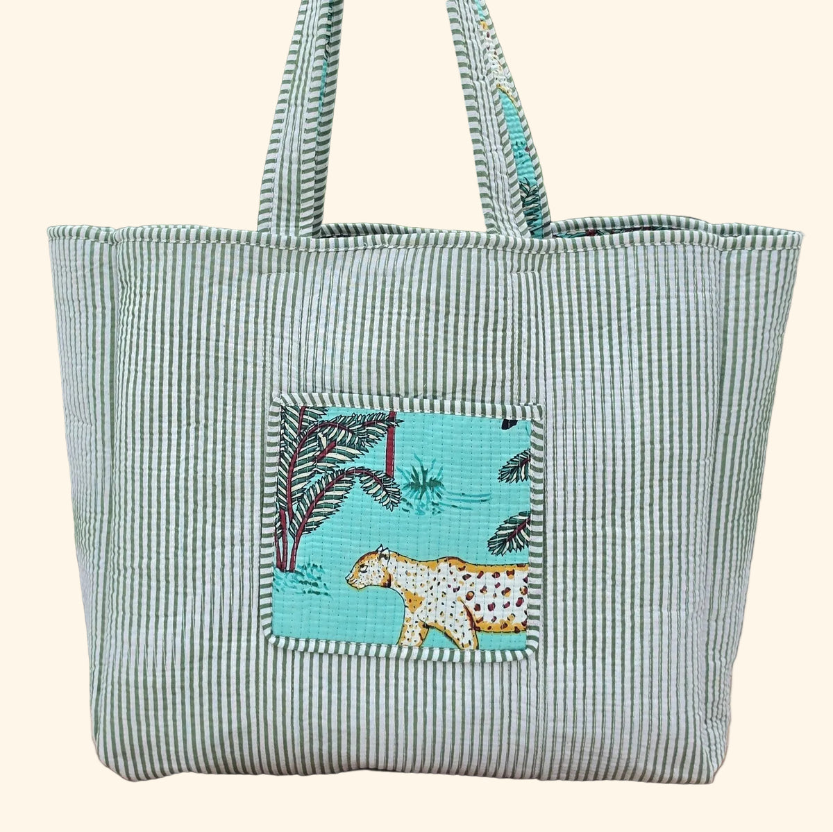 turqiose blue jungle print quilted cotton tote bag reversible machine washable with pockets reversible plain shot