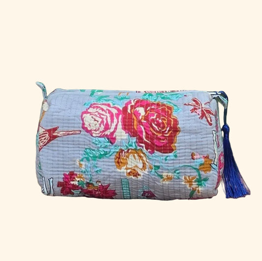 vibrant florals in gray background makeup bag with tassles and waterproof lining and pockets