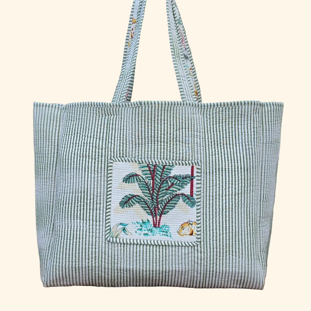 white jungle print quilted cotton tote bag reversible machine washable with pockets reversible plain shot