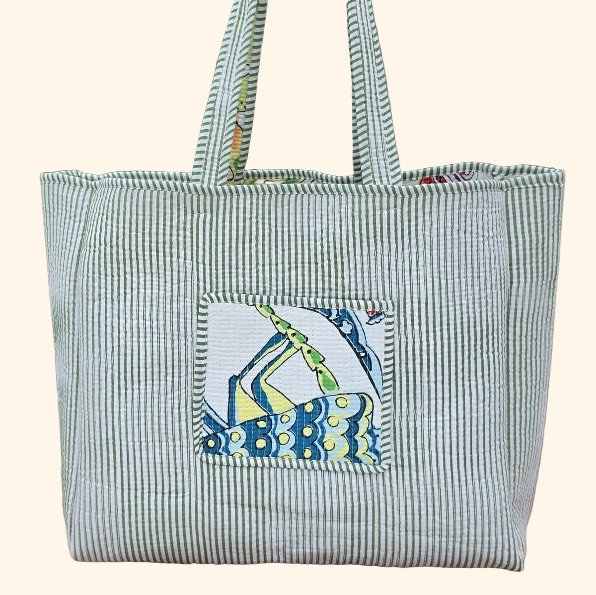 white vibrant bird print quilted cotton tote bag reversible machine washable with pockets reverse plain shot