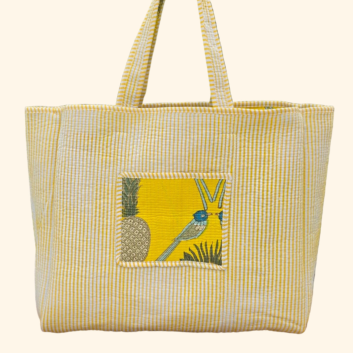 yellow and blue birds and fruits pattern quilted cotton tote bag reversible machine washable with pockets plain reverse image