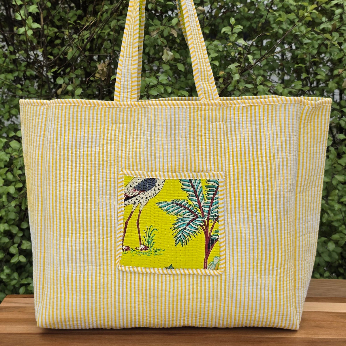 yellow jungle print quilted cotton tote bag reversible machine washable with pockets lifestyle reversible shot
