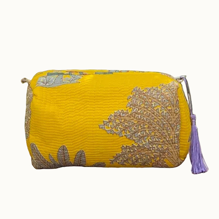 yellow palm beach desert block printed floral print makeup bag with tassles and waterproof lining and pockets