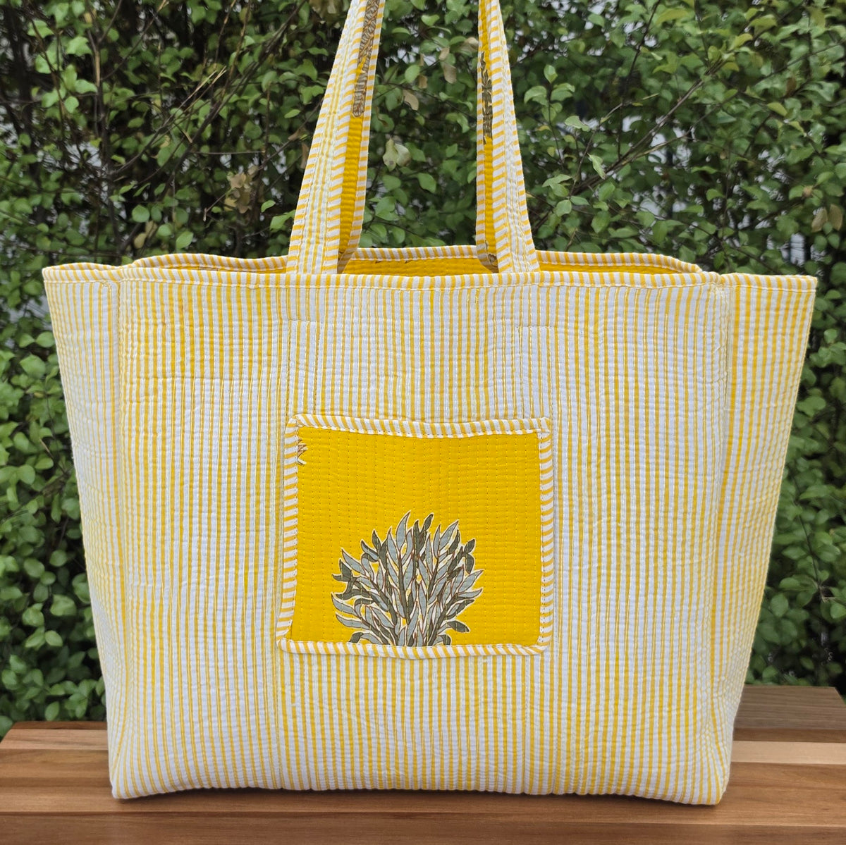 yellow palm beach quilted cotton tote bag reversible machine washable with pockets lifestyle reversed image
